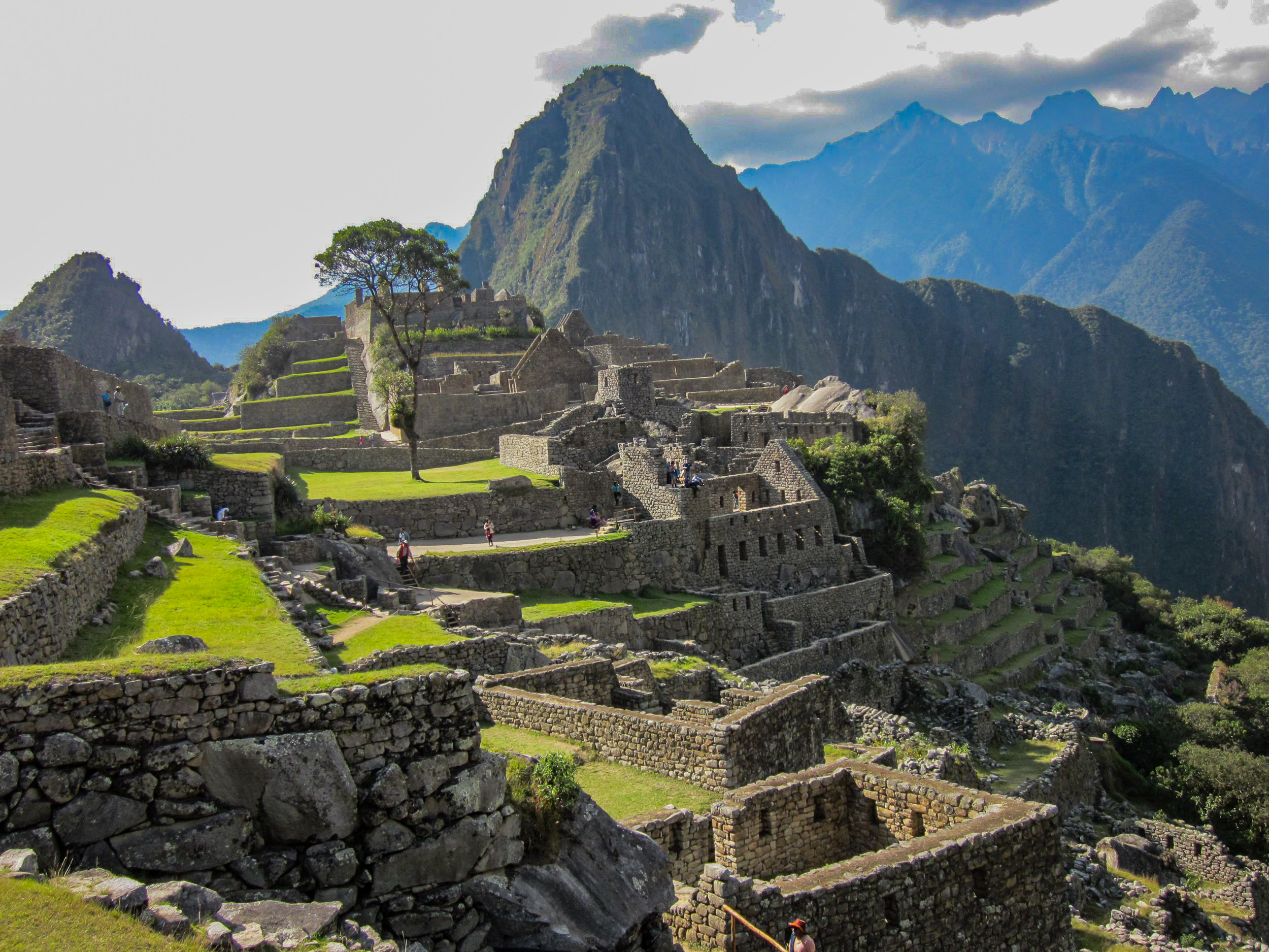 Machu Picchu ruins in Peru with Andes Mountains in the background